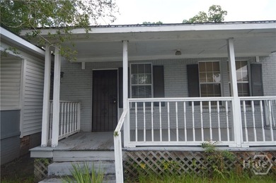 Investor Special! Unlock the potential at 1010 W. Victory Drive - photo 3