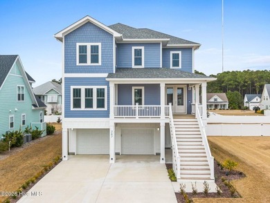 Discover coastal luxury at 367 Spicer Lake Drive, located in the