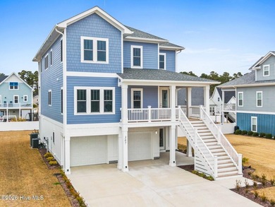 Discover coastal luxury at 367 Spicer Lake Drive, located in the