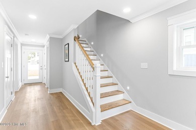 Discover coastal luxury at 367 Spicer Lake Drive, located in the