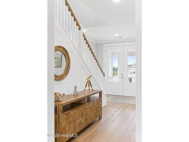 Discover coastal luxury at 367 Spicer Lake Drive, located in the