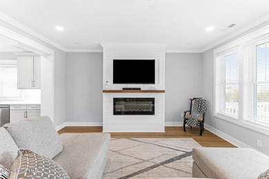 Discover coastal luxury at 367 Spicer Lake Drive, located in the