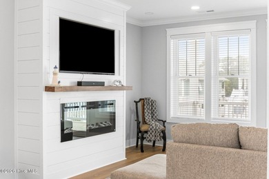 Discover coastal luxury at 367 Spicer Lake Drive, located in the