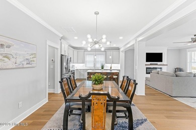 Discover coastal luxury at 367 Spicer Lake Drive, located in the