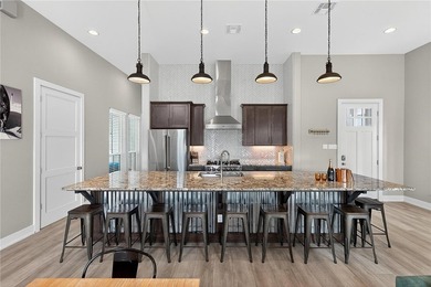 A REMARKABLE LAKESIDE RETREAT IN THE HEART OF CINNAMON SHORE - photo 12