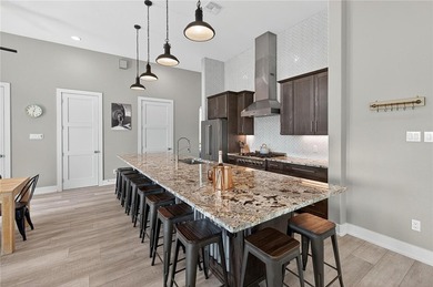A REMARKABLE LAKESIDE RETREAT IN THE HEART OF CINNAMON SHORE - photo 14