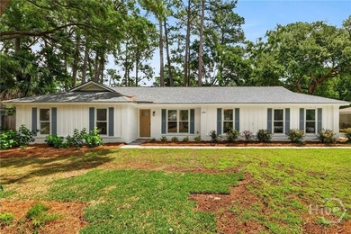 Welcome to this beautifully renovated 3-bedroom, 2-bath home - photo 1