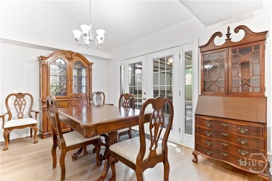 Open floor plan with Cathedral Ceiling in living room, French - photo 9
