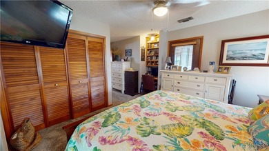 Welcome to this exceptional 2,488 sq ft two-story coastal home