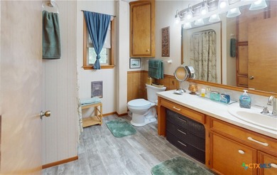 Welcome to this exceptional 2,488 sq ft two-story coastal home