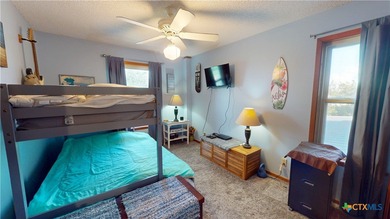 Welcome to this exceptional 2,488 sq ft two-story coastal home