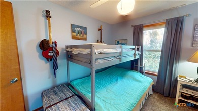 Welcome to this exceptional 2,488 sq ft two-story coastal home