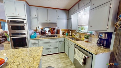 Welcome to this exceptional 2,488 sq ft two-story coastal home