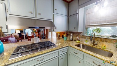 Welcome to this exceptional 2,488 sq ft two-story coastal home