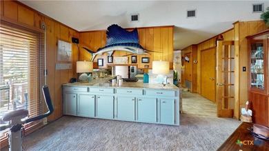 Welcome to this exceptional 2,488 sq ft two-story coastal home