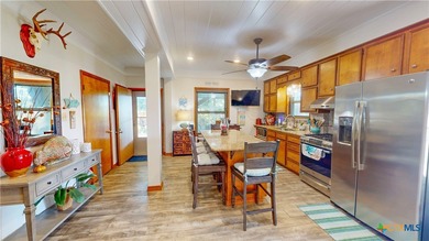 Welcome to this exceptional 2,488 sq ft two-story coastal home