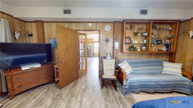 Welcome to this exceptional 2,488 sq ft two-story coastal home