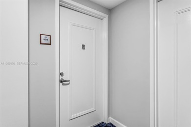 Located on a high floor of Metropolis II, Unit 908 offers a