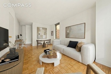 Residence 14B at the Cosmopolitan Condominium is a bright and - photo 3