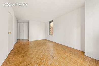 Residence 14B at the Cosmopolitan Condominium is a bright and - photo 4