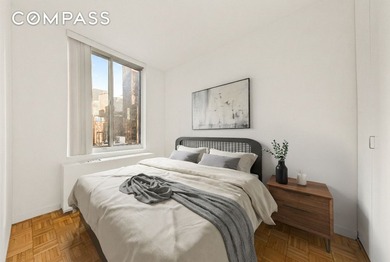 Residence 14B at the Cosmopolitan Condominium is a bright and - photo 5