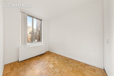 Residence 14B at the Cosmopolitan Condominium is a bright and - photo 6