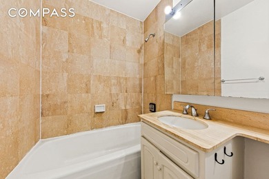 Residence 14B at the Cosmopolitan Condominium is a bright and - photo 8