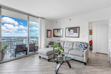 Located on a high floor of Metropolis II, Unit 908 offers a