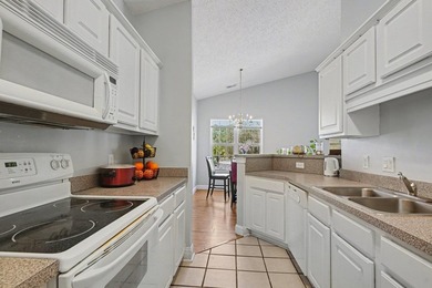 Welcome to 1141 Peace Pipe Place (Unit 201) in the gated - photo 12