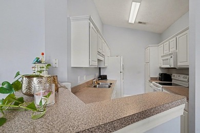 Welcome to 1141 Peace Pipe Place (Unit 201) in the gated - photo 13