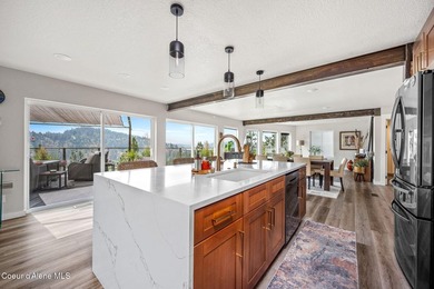 Beautifully remodeled 3-story home perched on Fernan Hill with - photo 14