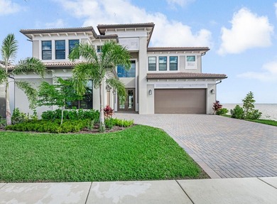 Lakefront luxury in this 5-bed single-family home in Avenir, new - photo 2