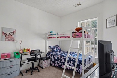 Welcome to 1141 Peace Pipe Place (Unit 201) in the gated - photo 23