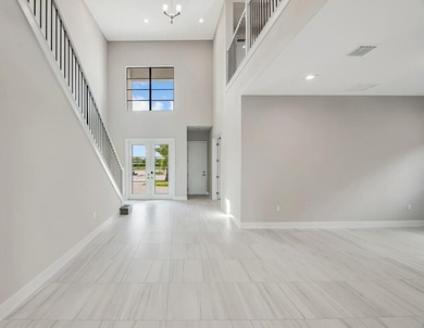 Lakefront luxury in this 5-bed single-family home in Avenir, new - photo 7