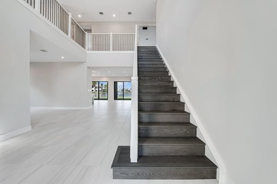 Lakefront luxury in this 5-bed single-family home in Avenir, new - photo 8