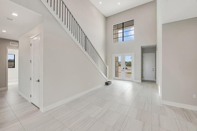 Lakefront luxury in this 5-bed single-family home in Avenir, new - photo 9
