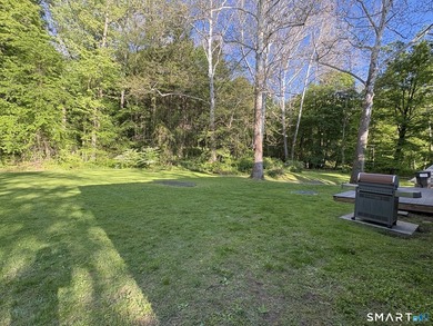 Tucked away on 2.37 private acres in southern New Milford, this - photo 32