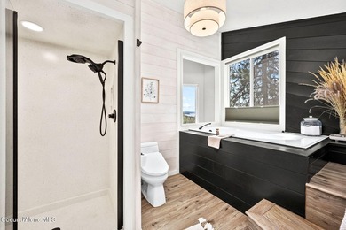 Beautifully remodeled 3-story home perched on Fernan Hill with - photo 34