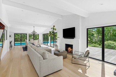 Secluded and serene on 1.1 lush acres in Water Mill, this - photo 4