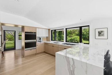Secluded and serene on 1.1 lush acres in Water Mill, this - photo 8