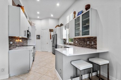 Welcome to this bright and beautifully maintained single-story - photo 11