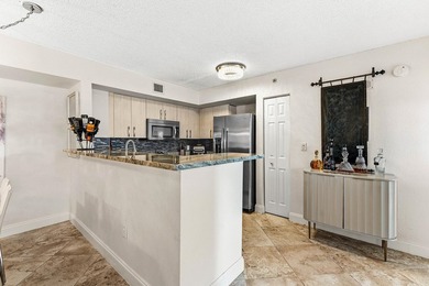 Step into this beautifully updated 2-bedroom, 2-bath waterfront - photo 5