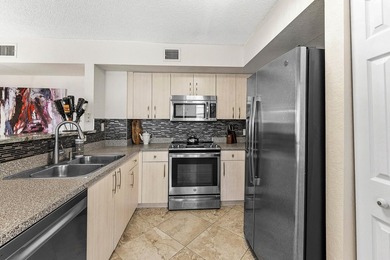 Step into this beautifully updated 2-bedroom, 2-bath waterfront - photo 6