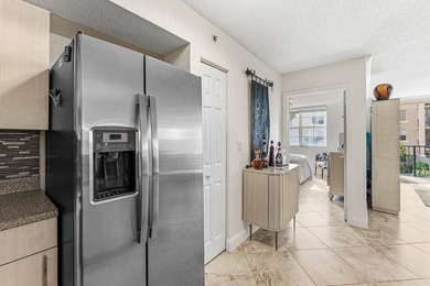 Step into this beautifully updated 2-bedroom, 2-bath waterfront - photo 8