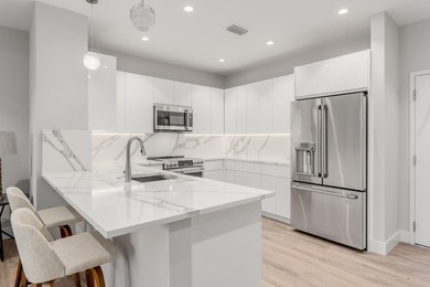Experience refined waterfront living in this brand-new 3rd-floor - photo 11