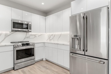 Experience refined waterfront living in this brand-new 3rd-floor - photo 13