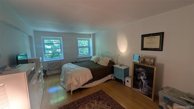 Open floor plan with a dining area and a well-lit living room - photo 11