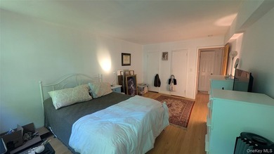 Open floor plan with a dining area and a well-lit living room - photo 12