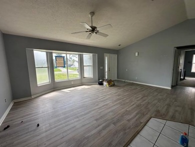 Wonderful opportunity to make this house a home. Screened Porch - photo 12