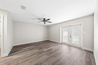 Welcome to a home where comfort meets style. This updated - photo 12